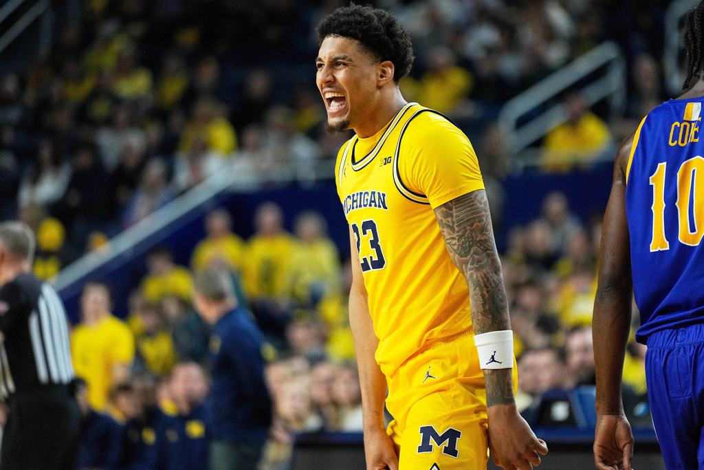Michigan forward Yaxel Lendeborg reacts during the first half of an NCAA college basketball game against McNeese, Monday, Dec. 29, 2025, in Ann Arbor, Mich. (AP Photo/Ryan Sun)