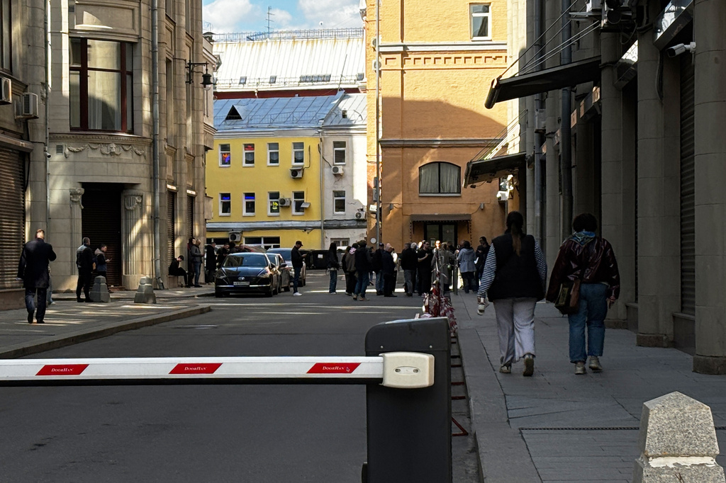 Activists gather outside a presidential administration building, in Moscow, Saturday, April 4, 2026, to sign a petition against internet restrictions. (AP Photo)
