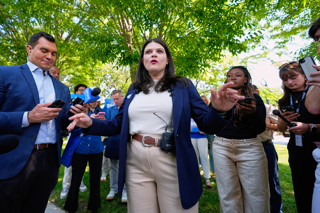 Rep. Haley Stevens, D-Mich., a candidate in the Democratic primary for U.S. Senate in Michigan, talks to the media after voting at the Baldwin Public Library, Tuesday, Aug. 4, 2026, in Birmingham, Mich. (AP Photo/Paul Sancya)
