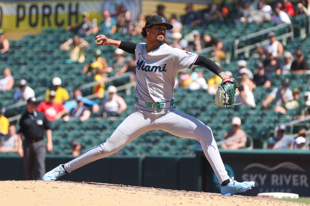 Miami Marlins pitcher Eury Pérez throws to an Athletics batter during the sixth inning of a baseball game Sunday, July 5, 2026, in West Sacramento, Calif. (AP Photo/Scott Marshall)