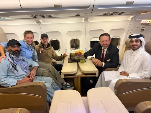 In this photo released by Qatar's Foreign Ministry, U.S. citizen Amir Amiri, left, poses next to an unidentified woman, aboard a plane in Kabul, Afghanistan, on Sunday, Sept. 28, 2025, after being released from an Afghan prison. With him, from right, are a Qatari diplomat, Deputy Assistant to the U.S. President Sebastian Gorka, and U.S. Special Envoy for Hostage Response Adam Boehler.(Qatar Foreign Ministry via AP) In this photo released by Qatar's Foreign Ministry, U.S. citizen Amir Amiri, left, poses next to an unidentified woman, aboard a plane in Kabul, Afghanistan, on Sunday, Sept. 28, 2025, after being released from an Afghan prison. With him, from right, are a Qatari diplomat, Deputy Assistant to the U.S. President Sebastian Gorka, and U.S. Special Envoy for Hostage Response Adam Boehler.(Qatar Foreign Ministry via AP)
