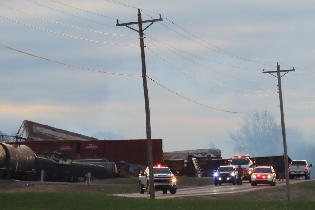 Emergency personnel work at the scene of a derailed CSX train in Todd County, Ky., on Tuesday, Dec. 30, 2025. (WEKT via AP)