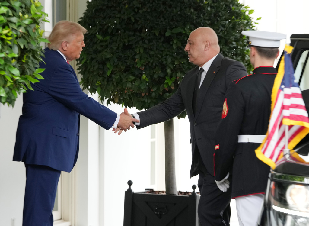 President Donald Trump greets Lebanese President Joseph Aoun on his arrival at the White House, Tuesday, July 21, 2026, in Washington. (AP Photo/Mark Schiefelbein)