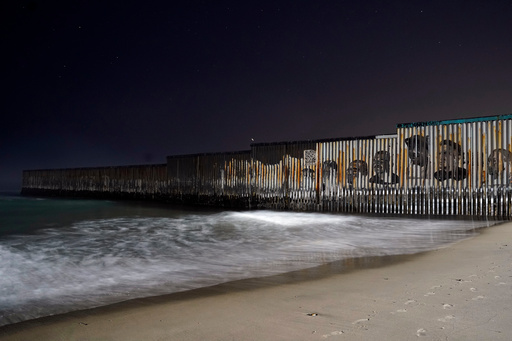 FILE - The border fence ends at the Pacific Ocean, Dec. 20, 2022, in Tijuana, Mexico. (AP Photo/Marcio Jose Sanchez, File) FILE - The border fence ends at the Pacific Ocean, Dec. 20, 2022, in Tijuana, Mexico. (AP Photo/Marcio Jose Sanchez, File)