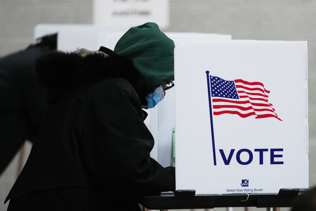 Voters fill out their ballot on Election Day, Tuesday, Nov. 4, 2025, in Detroit. (AP Photo/Paul Sancya)
