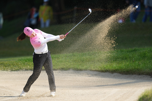 Rio Takeda of Japan hits out of a bunker on the 3rd hole during the pool B match against Team South Korea for the LPGA International Crown golf tournament at the New Korea Country Club in Goyang, South Korea, Saturday, Oct. 25, 2025. (AP Photo/Lee Jin-man) Rio Takeda of Japan hits out of a bunker on the 3rd hole during the pool B match against Team South Korea for the LPGA International Crown golf tournament at the New Korea Country Club in Goyang, South Korea, Saturday, Oct. 25, 2025. (AP Photo/Lee Jin-man)