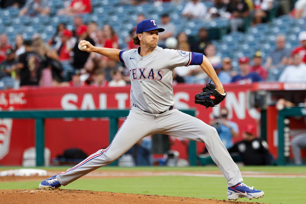 Texas Rangers starting pitcher Jacob Degrom (48) throws during the first inning of a baseball game against the Los Angeles Angels, Thursday, Aug. 13, 2026, in Anaheim, Calif. (AP Photo/Caroline Brehman)