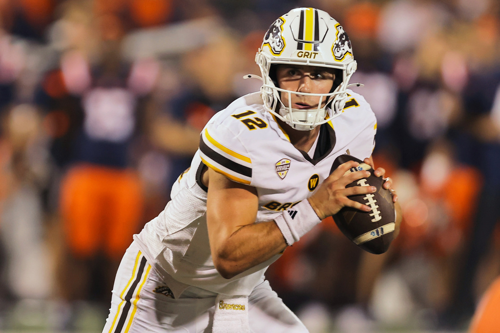 FILE - Western Michigan Broc Lowry runs with the ball during an NCAA football game in Champaign, Ill., Sept. 13, 2025. (AP Photo/Melissa Tamez, File)