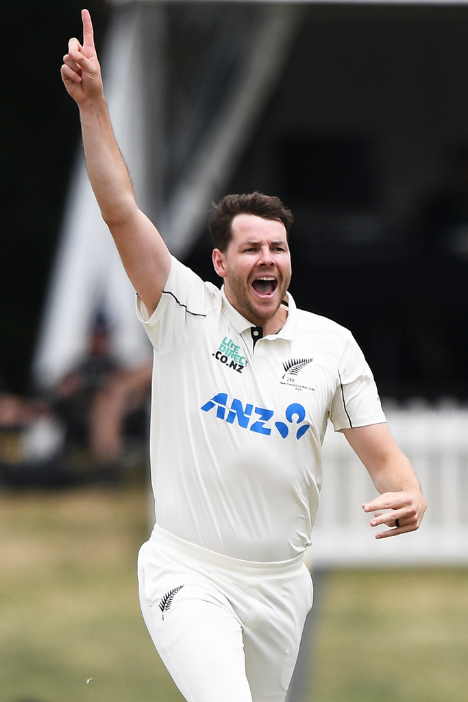 New Zealand's Jacob Duffy, left, celebrates after taking the wicket of the West Indies' Tagenarine Chanderpaul on Day 4 of their cricket test match in Christchurch, New Zealand, Friday, Dec. 5, 2025. (Chris Symes/Photosport via AP)