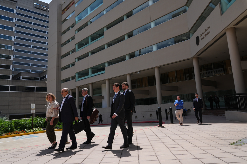Attorneys leave the Edward A. Garmatz United States District Courthouse after a judge postponed a civil trial over the 2024 deadly collapse of the Francis Scott Key Bridge, Monday, June 1, 2026, in Baltimore. (AP Photo/Stephanie Scarbrough)