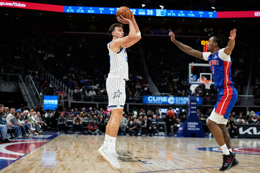 Orlando Magic forward Franz Wagner, left, shoots against Detroit Pistons forward Ronald Holland II during the first half of an NBA basketball game Wednesday, Oct. 29, 2025, in Detroit. (AP Photo/Ryan Sun) Orlando Magic forward Franz Wagner, left, shoots against Detroit Pistons forward Ronald Holland II during the first half of an NBA basketball game Wednesday, Oct. 29, 2025, in Detroit. (AP Photo/Ryan Sun)