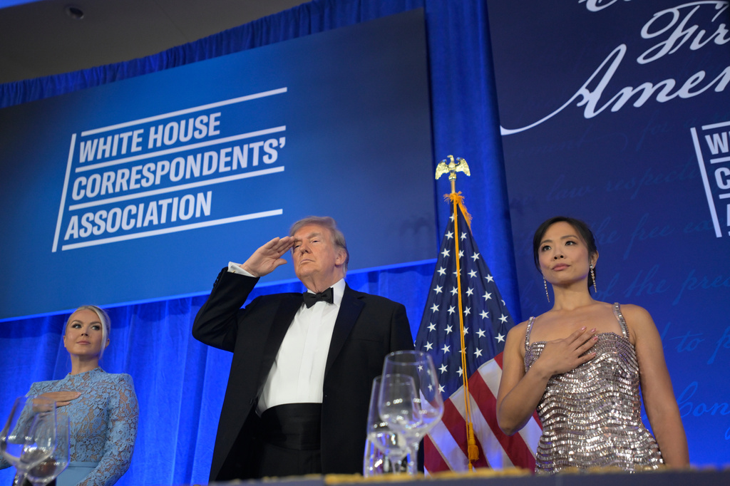 President Donald Trump attends the White House Correspondents' Association Dinner, at the Waldorf Astoria Washington DC, Friday, July 24, 2026, in Washington, with with WHCA president Weijia Jiang, right and White House press secretary Karoline Leavitt. (AP Photo/Rod Lamkey, Jr.)