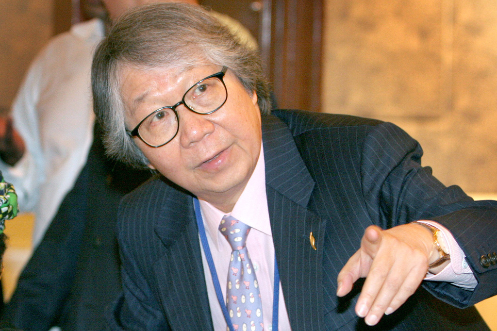 FILE - Singapore's Ambassador at Large Tommy Koh gestures during a luncheon in Singapore, Sept. 18, 2006, on the sidelines of the IMF-World Bank annual meetings. (AP Photo/Wong Maye-E, File)