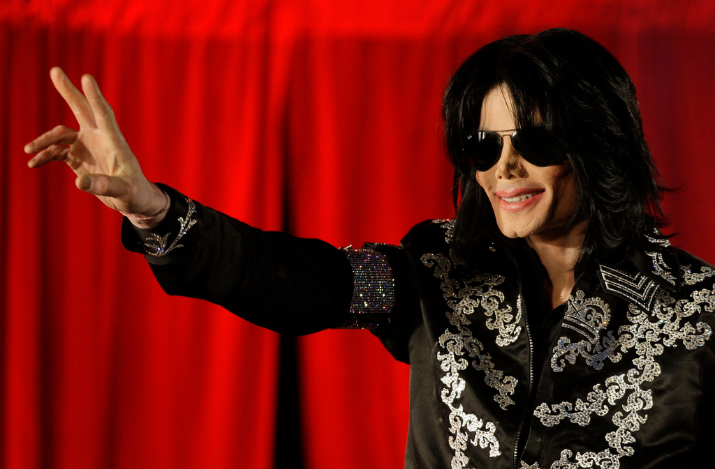 FILE - Michael Jackson appears at a news conference on March 5, 2009, to announce ten live concerts at the London O2 Arena in south London. (AP Photo/Joel Ryan, File)