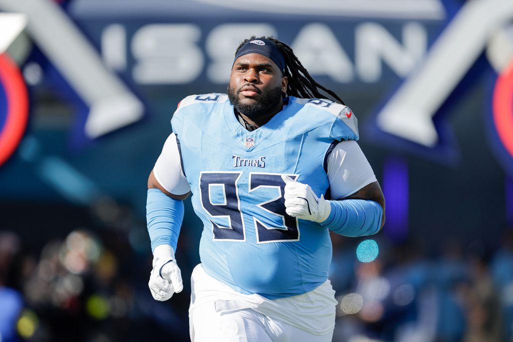 FILE - Tennessee Titans nose tackle T'Vondre Sweat (93) runs onto the field prior to an NFL football game against the Seattle Seahawks, Sunday, Nov. 23, 2025, in Nashville, Tenn. (AP Photo/Stew Milne, File)