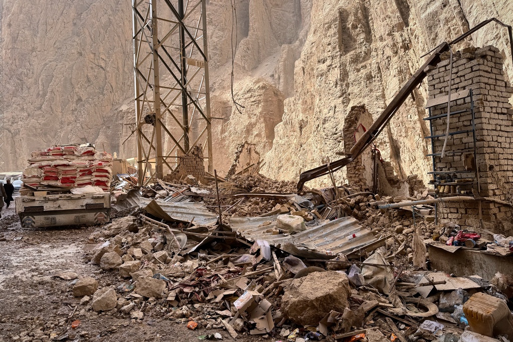 Damage is seen along a road near the site of a powerful 6.3-magnitude earthquake in a rural area of the Khulm District in Samangan Province, northern Afghanistan, Monday, Nov. 3, 2025. (AP Photo/Sirat Noori)