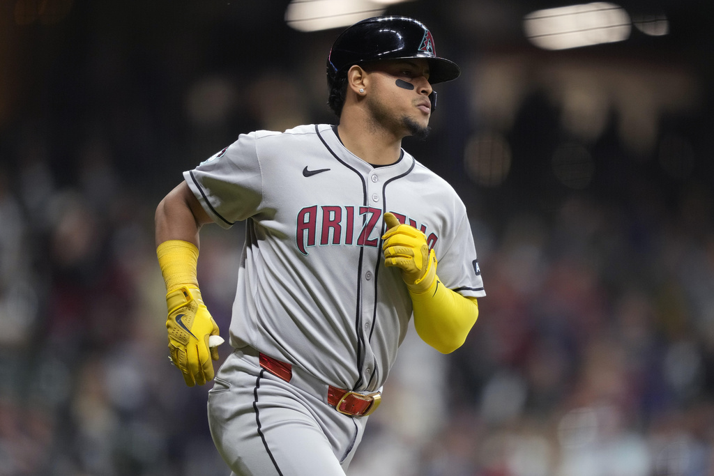 Arizona Diamondbacks' Gabriel Moreno runs the bases after hitting a three-run home run during the fourth inning of a baseball game against the Milwaukee Brewers Tuesday, Aug. 26, 2025, in Milwaukee. (AP Photo/Kayla Wolf)