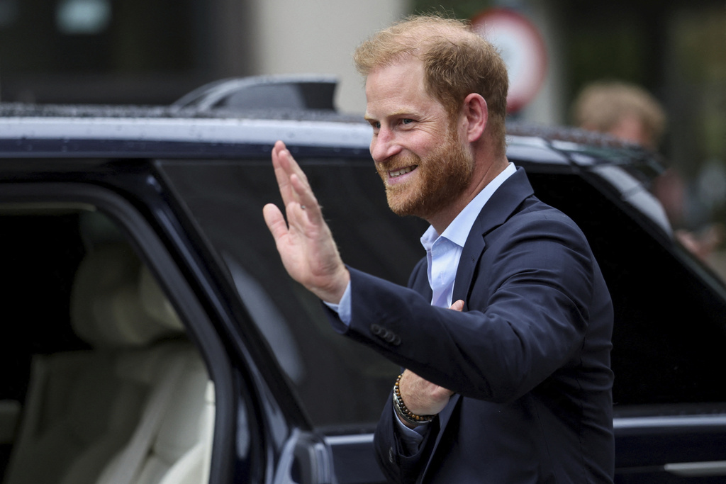 Britain's Prince Harry gestures, as he departs, following his visit to Centre for Blast Injury Studies at Imperial College London, in London, Wednesday, Sept. 10, 2025. (Suzanne Plunkett, Pool Photo via AP)