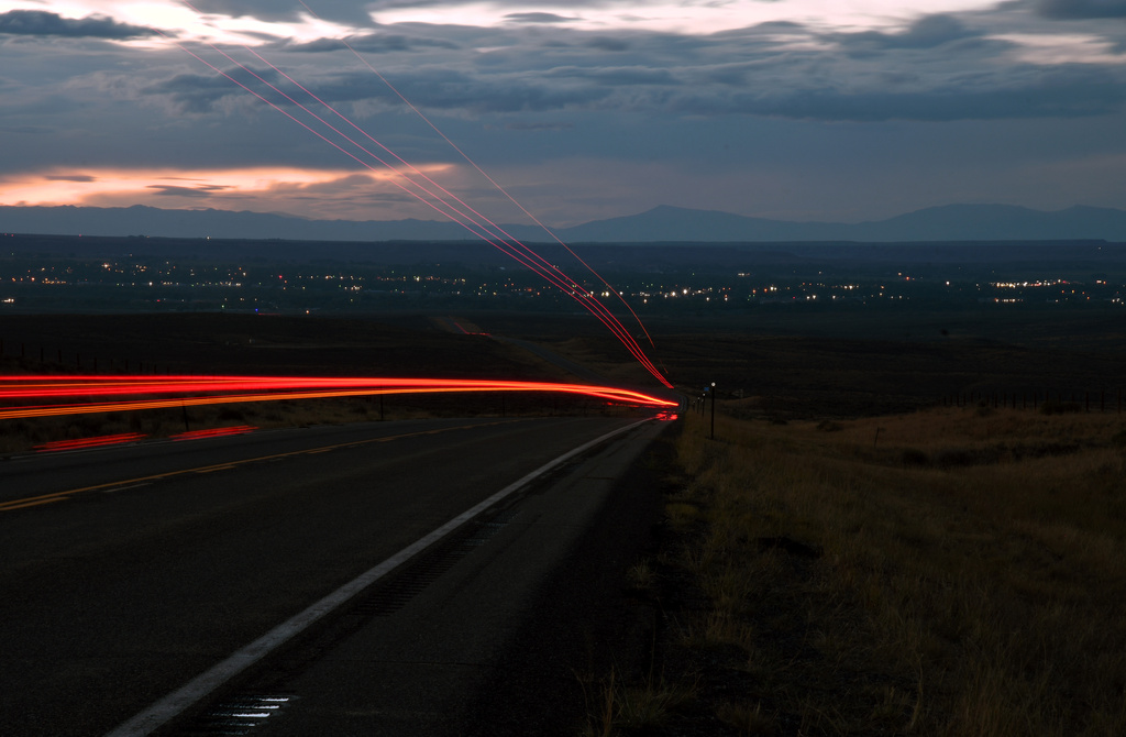 A truck passes through the Wind River Reservation on its way to Riverton, Wyo., on Saturday, Aug. 15, 2026. (AP Photo/Thomas Peipert)