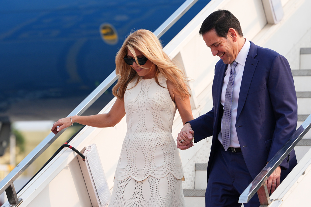 United States Secretary of State Marco Rubio disembarks his plane with his wife Jeanette at Netaji Subhash Chandra Bose International Airport in Kolkata, India, Saturday, May 23, 2026. (AP Photo/Julia Demaree Nikhinson, Pool)