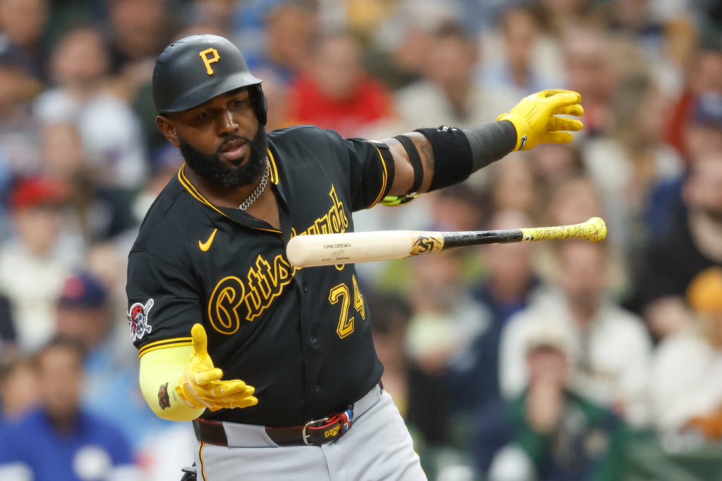 Pittsburgh Pirates designated hitter Marcell Ozuna loses his bat after fouling off a pitch during the fourth inning of a baseball game against the Milwaukee Brewers, Sunday, April 26, 2026, in Milwaukee. (AP Photo/Jeffrey Phelps)