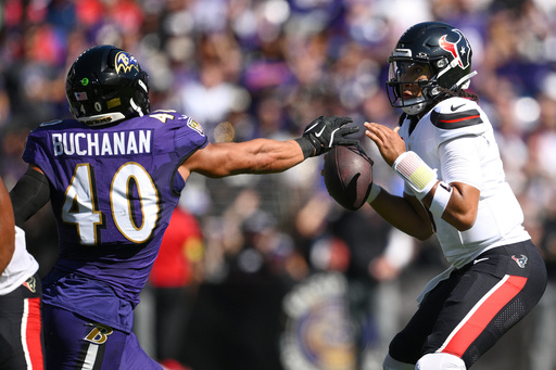 Baltimore Ravens linebacker Teddye Buchanan (40) defends against Houston Texans quarterback C.J. Stroud during the first half of an NFL football game, Sunday, Oct. 5, 2025, in Baltimore. (AP Photo/Nick Wass) Baltimore Ravens linebacker Teddye Buchanan (40) defends against Houston Texans quarterback C.J. Stroud during the first half of an NFL football game, Sunday, Oct. 5, 2025, in Baltimore. (AP Photo/Nick Wass)