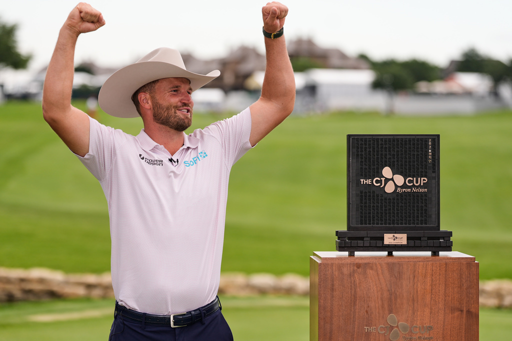 Wyndham Clark celebrates after winning the CJ Cup Byron Nelson golf tournament in McKinney, Texas, Sunday, May 24, 2026. (AP Photo/Tony Gutierrez)