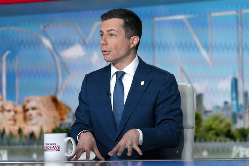 Transportation Secretary Pete Buttigieg speaks during an interview with &quot;Fox News Sunday&quot; anchor Shannon Bream at the Fox News bureau in Washington, Sunday, March 10, 2024. (AP Photo/Jose Luis Magana)
