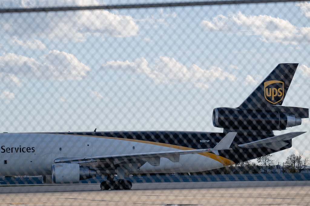 FILE - An MD-11F is seen parked at the UPS North Maintenance Hangar, Nov. 8, 2025, in Louisville, Ky. (AP Photo/Jon Cherry, File)