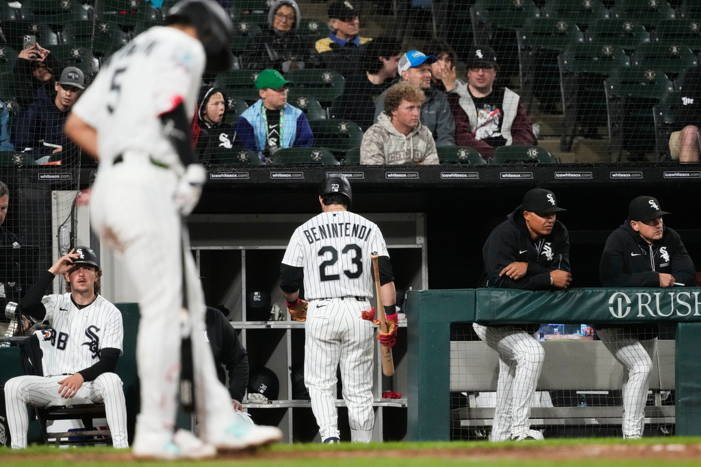 Chicago White Sox's Andrew Benintendi (23) walks to the dugout after being called out on strikes during the third inning of a baseball game against the Los Angeles Angels in Chicago, Monday, April 27, 2026. (AP Photo/Nam Y. Huh)