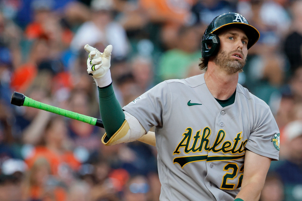 Athletics' Jeff McNeil tosses his bat after striking out against the Detroit Tigers during the fifth inning of a baseball game Wednesday, July 8, 2026, in Detroit. (AP Photo/Duane Burleson)