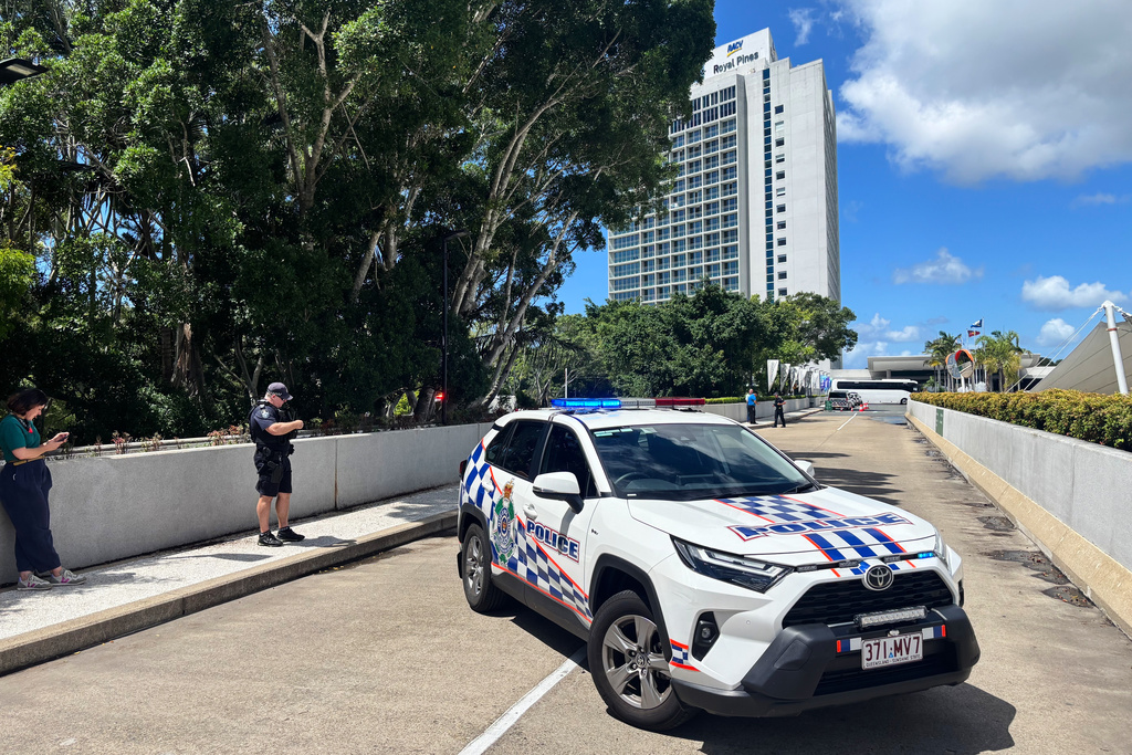 A police car blocks the entrance to a hotel resort where the Iranian women's soccer team is staying on the Gold Coast, Australia, Tuesday, March 10, 2026. (AP Photo/John Pye)
