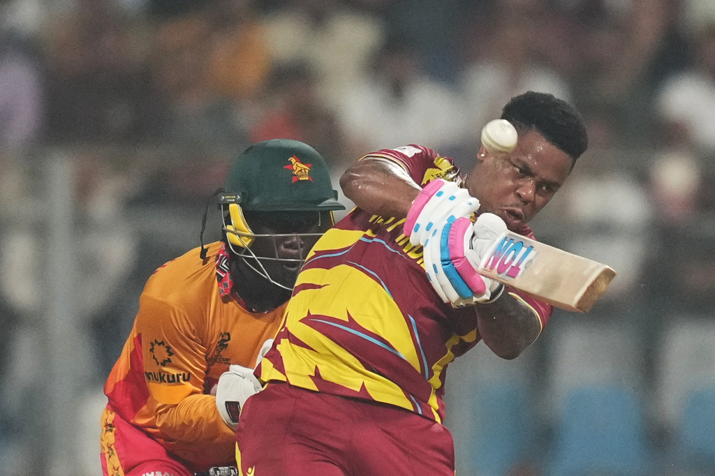 West Indies' Shimron Hetmyer hits a six during the T20 World Cup cricket match between Zimbabwe and West Indies in Mumbai, India, Monday, Feb. 23, 2026. (AP Photo/Rafiq Maqbool)