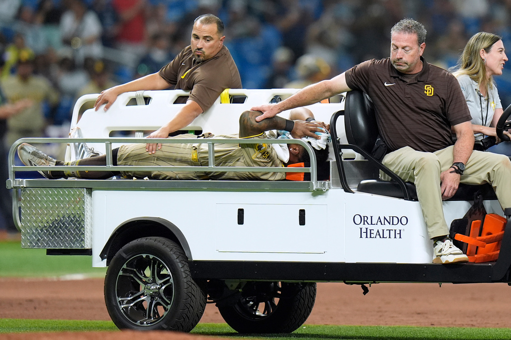 San Diego Padres left fielder Luis Rengifo is carted off the field after getting injured during the seventh inning of a baseball game against the Tampa Bay Rays Saturday, Aug. 29, 2026, in St. Petersburg, Fla. (AP Photo/Chris O'Meara)