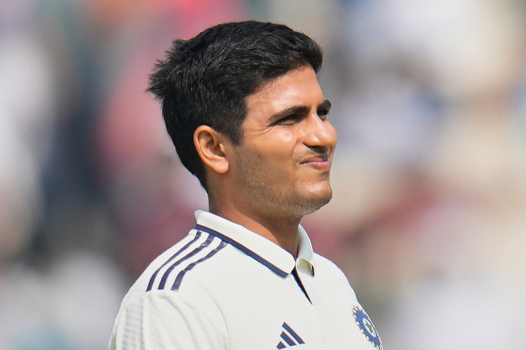 India's captain Shubman Gill reacts as he leaves the field after retired hurt on the second day of the first cricket test match between India and South Africa in Kolkata, India, Saturday, Nov. 15, 2025. (AP Photo/Aijaz Rahi)
