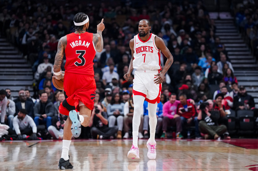 Toronto Raptors forward Brandon Ingram (3) plays the ball against Houston Rockets forward Kevin Durant (7) during the first half of preseason NBA basketball action in Toronto, Wednesday, Oct. 29, 2025. (Thomas Skrlj/The Canadian Press via AP) Toronto Raptors forward Brandon Ingram (3) plays the ball against Houston Rockets forward Kevin Durant (7) during the first half of preseason NBA basketball action in Toronto, Wednesday, Oct. 29, 2025. (Thomas Skrlj/The Canadian Press via AP)
