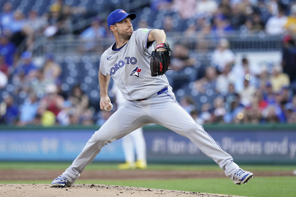 Toronto Blue Jays pitcher Max Scherzer delivers during the first inning of a baseball game against the Pittsburgh Pirates Tuesday, Aug. 19, 2025, in Pittsburgh. (AP Photo/Matt Freed)