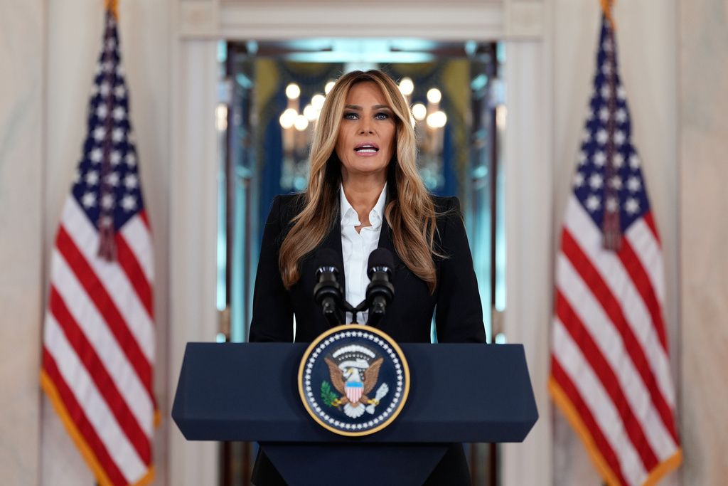 First lady Melania Trump speaks in the Grand Foyer of the White House, Friday, Oct. 10, 2025, in Washington. (AP Photo/Alex Brandon)