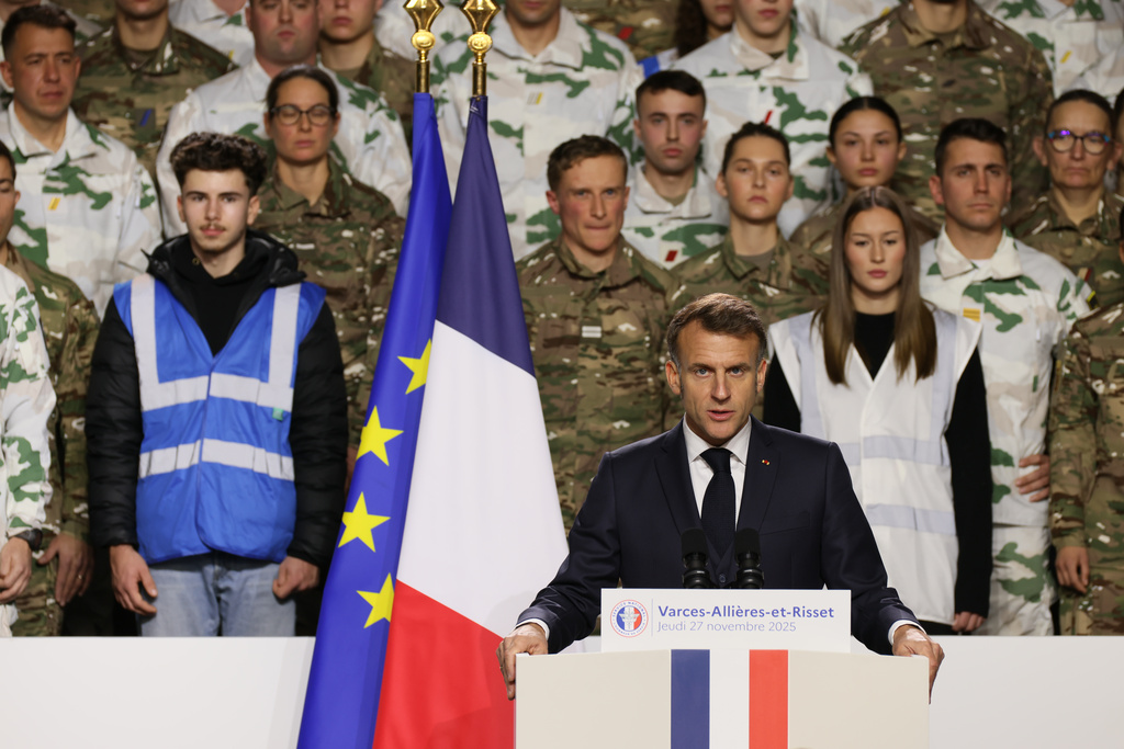 France's President Emmanuel Macron, unveils a new national military service as he speaks to the army at the military base in Varces, French Alps, Thursday, Nov. 27, 2025.(AP Photo/Thomas Padilla, Pool)