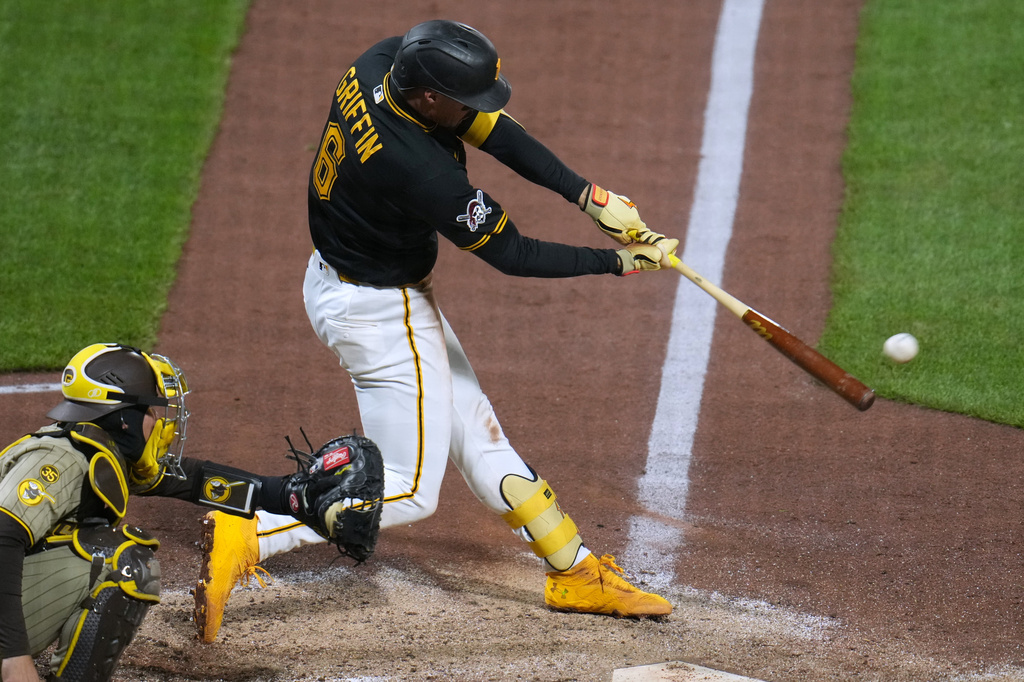 Pittsburgh Pirates' Konnor Griffin (6) singles off San Diego Padres pitcher Adrian Morejon, driving in two runs, during the eighth inning of a baseball game in Pittsburgh, Tuesday, April 7, 2026. (AP Photo/Gene J. Puskar)