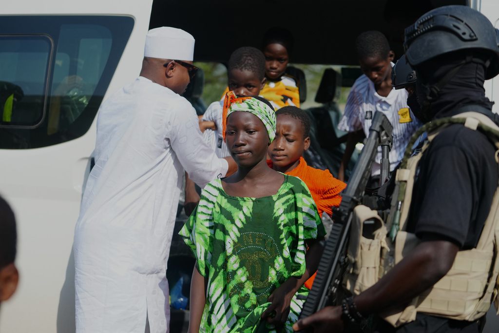 Freed students from St. Mary's Catholic School in the Papiri community arrive at the government house, in Minna, Nigeria, Monday, Dec. 22, 2025. (AP Photo/Sunday Alamba)