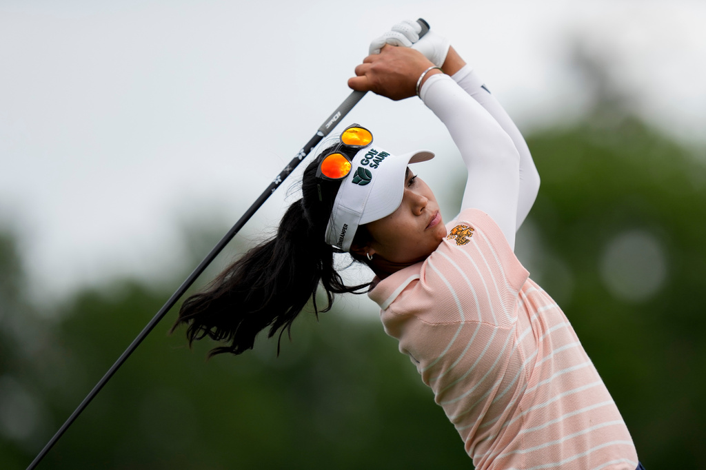 Patty Tavatanakit, of Thailand, hits on the 17th hole during the first round of the Chevron Championship LPGA golf tournament Thursday, April 23, 2026, in Houston. (AP Photo/David J. Phillip)