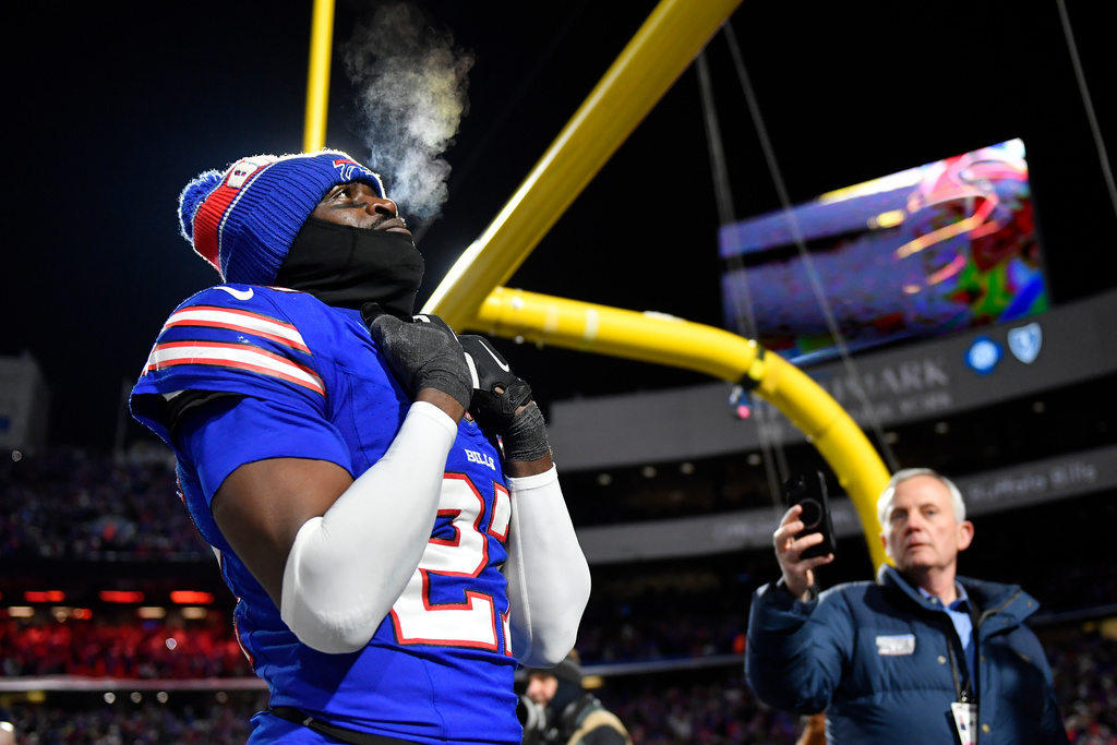 Buffalo Bills cornerback Tre'Davious White (27) remains on the field to watch a tribute video after the Bills beat the New York Jets in the Bills' final regular-season NFL football home game in Highmark Stadium Sunday, Jan. 4, 2026, in Orchard Park, N.Y.(AP Photo/Adrian Kraus)