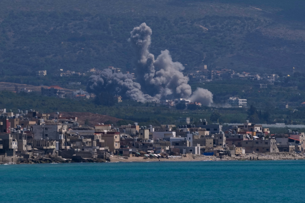 Smoke rises from an Israeli airstrike that hit Qlaileh village, as it seen from the southern port city of Tyre, Lebanon, Tuesday, June 2, 2026. (AP Photo/Mohammed Zaatari)