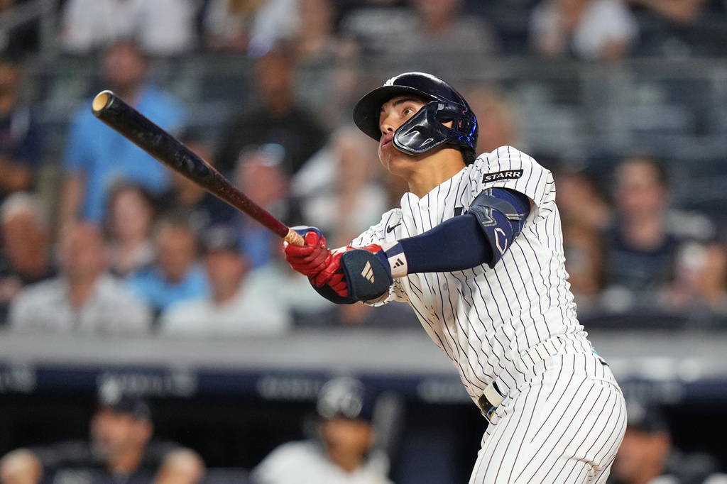 New York Yankees' George Lombard Jr. hits a home run during the fifth inning of a baseball game against the St. Louis Cardinals Tuesday, Aug. 4, 2026, in New York. (AP Photo/Frank Franklin II)