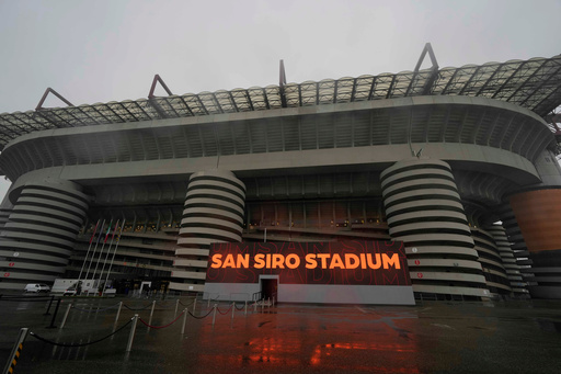 FILE - Rain falls on San Siro Stadium, venue for the opening ceremony of the Milan Cortina 2026 Winter Olympics, in Milan, Italy, Monday, Jan. 27, 2025. (AP Photo/Luca Bruno, File) FILE - Rain falls on San Siro Stadium, venue for the opening ceremony of the Milan Cortina 2026 Winter Olympics, in Milan, Italy, Monday, Jan. 27, 2025. (AP Photo/Luca Bruno, File)