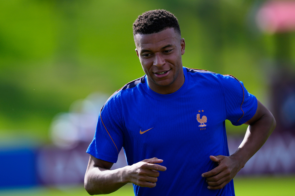 France's Kylian Mbappe runs during a training session ahead of the team's World Cup Group I soccer match against Iraq in Philadelphia, Sunday, June 21, 2026. (AP Photo/Petr David Josek)