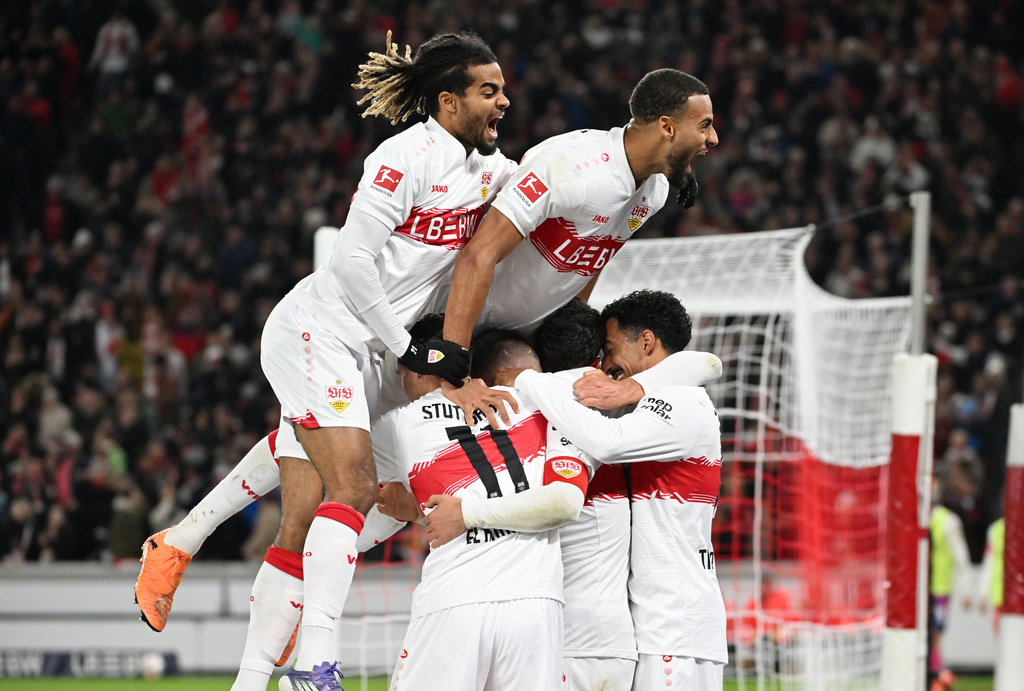 Stuttgart players celebrate after scoring their side's second goal of the game during the Bundesliga soccer match between VfB Stuttgart and FSV Mainz 05, in Stuttgart, Germany, Sunday, Oct. 26, 2025. (Marijan Murat/dpa via AP)