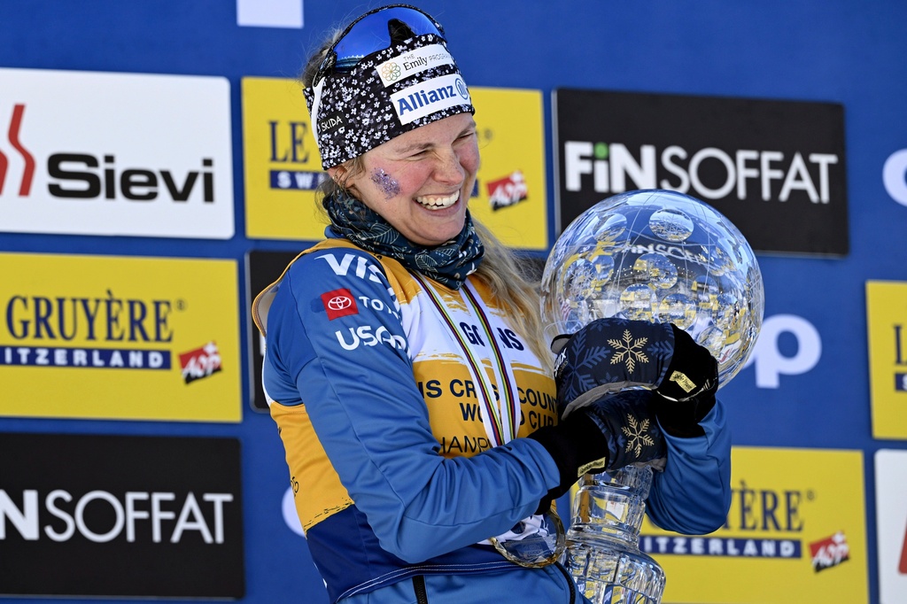 FILE - Women's cross country skiing World Cup overall winner Jessie Diggins, of the United States, celebrating on the podium at the FIS Nordic World Cup Lahti Ski Gamess in Lahti, Finland, Sunday, March 23, 2025. (Emmi Korhonen/Lehtikuva via AP, File)