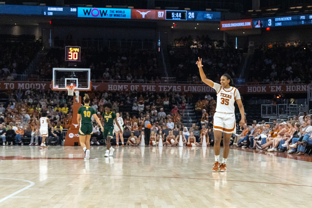 Texas forward Madison Booker (35) waves to the bench as she competes against Southeastern Louisiana during the second half of an NCAA college basketball game Sunday, Dec. 28, 2025, in Austin, Texas. (AP Photo/Stephen Spillman)